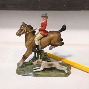 Austrian fox hunter with  hound figurine